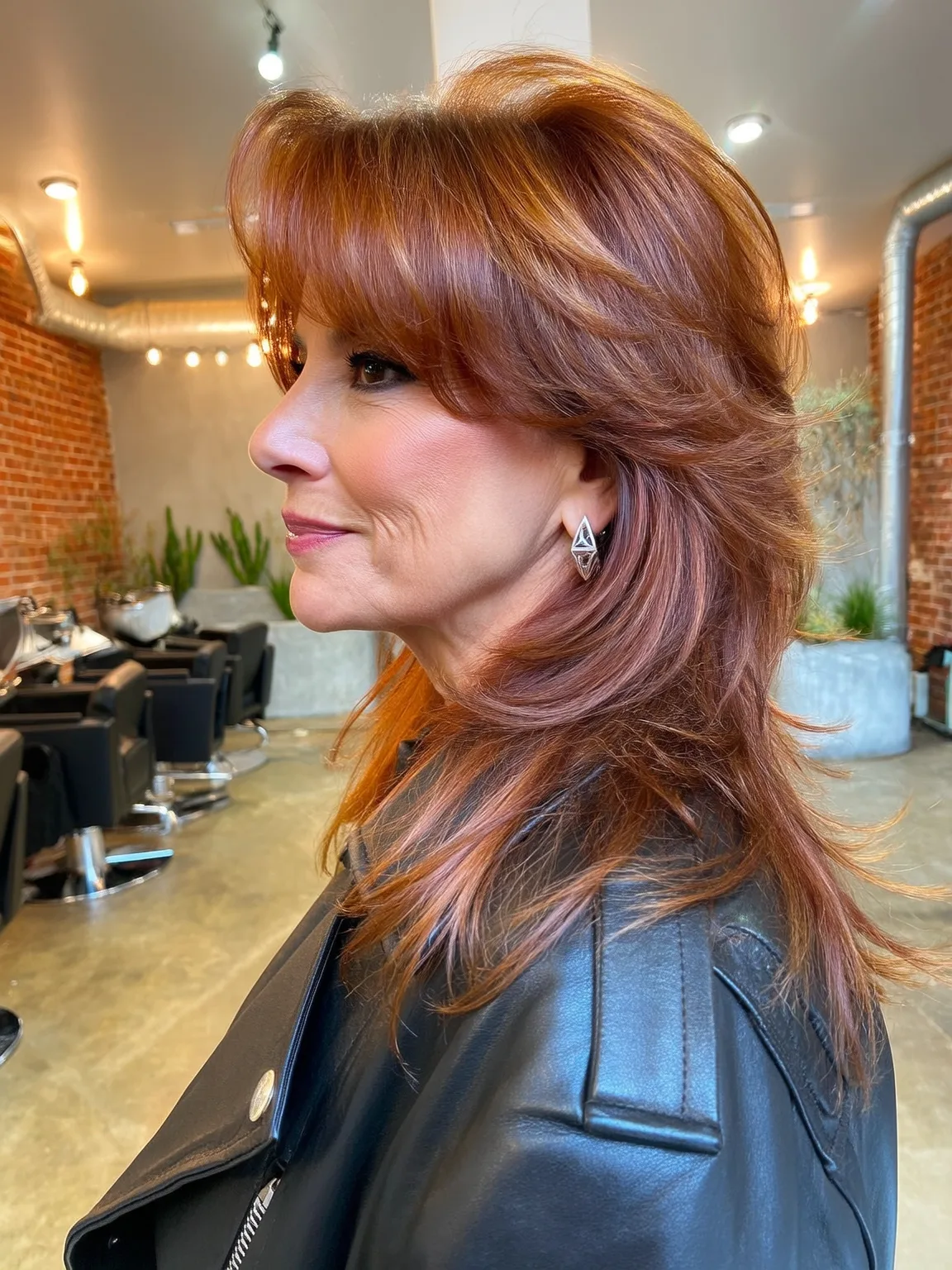 Feathered Layers with Glossy Warm Auburn Waves